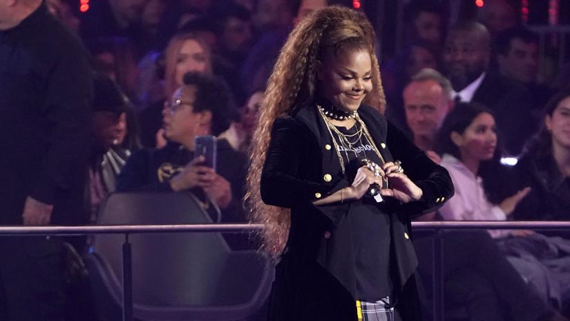Singer Janet Jackson makes a heart symbol after receiving the Global Icon Award at the 2018 MTV Europe Music Awards at Bilbao Exhibition Centre in Bilbao, Spain on Nov 4, 2018. REUTERS/FILE PHOTO