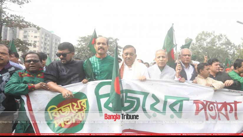 Home Minister Asaduzzaman Khan Kamal taking part in the flag procession on Saturday (Dec 15). PHOTO: Bangla Tribune/Sazzad Hossain