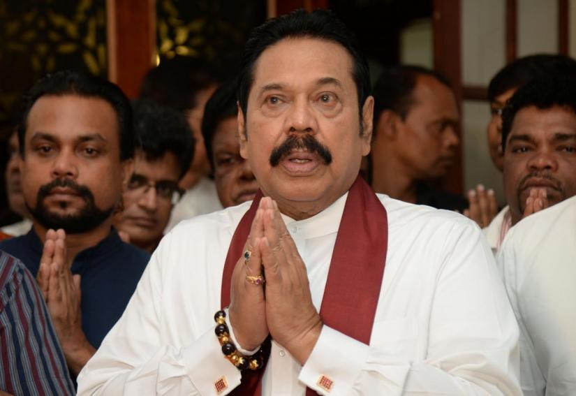 Sri Lanka`s former leader Mahinda Rajapaksa attends a religious ceremony after he resigned from the prime minister post in Colombo, Sri Lanka December 15, 2018. REUTERS