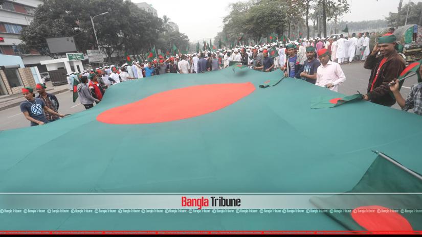 Flag procession participated by hundreds of people on Saturday (Dec 15). PHOTO: Bangla Tribune/Sazzad Hossain