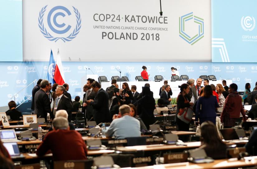 Participants take part in plenary session, during the final day of the COP24 U.N. Climate Change Conference 2018 in Katowice, Poland, December 14, 2018. REUTERS