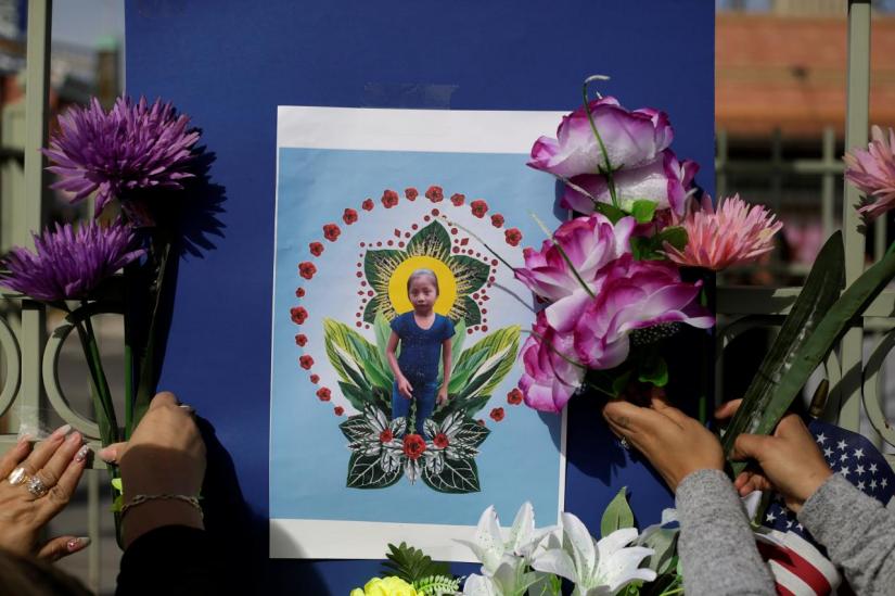 A picture of Jakelin Caal, a 7-year-old Guatemalan girl who died in U.S. custody after crossing illegally from Mexico to the U.S., is seen during a protest held to demand justice for her in El Paso, U.S. December 15, 2018. REUTERS