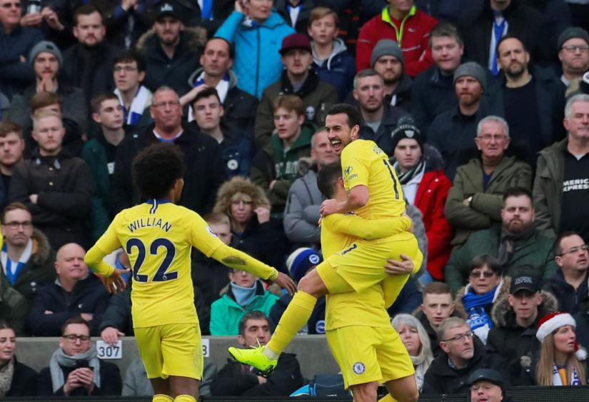 Chelsea`s Pedro celebrates scoring their first goal with team mates. Dec 16, 2018. Action Images via Reuters