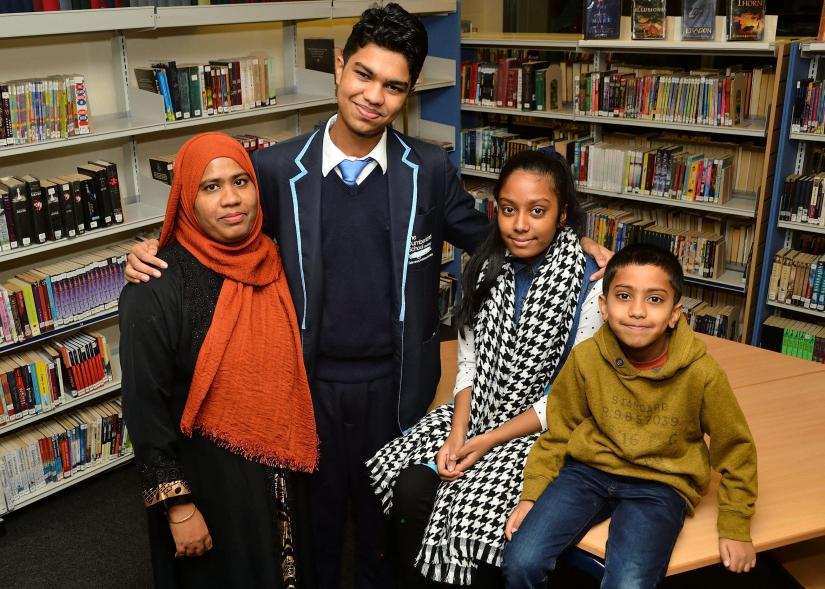 Maheraj Ahmed with his mother Rani, sister Sanzida and brother Tanzir, says he hopes to one day become a heart surgeon.