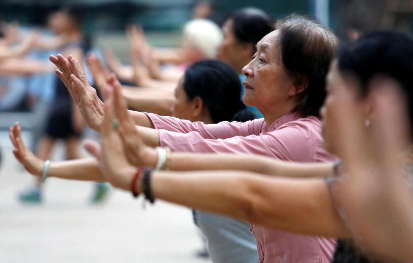 Elderly people exercise at a public park in Hanoi, Vietnam October 9, 2018. REUTERS