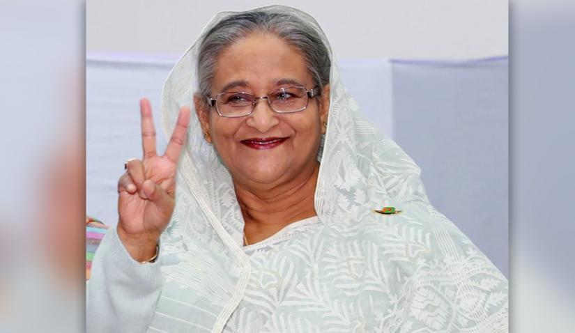 Prime Minister Sheikh Hasina shows victory sign after casting her vote. Dec 30, 2018. PMO