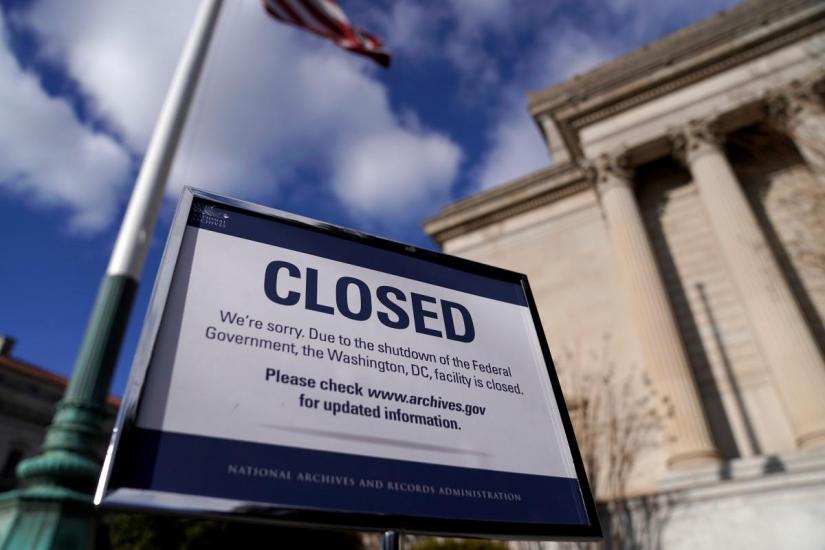 A sign declares the National Archive is closed due to a partial federal government shutdown in Washington, US on Dec 22, 2018. REUTERS/File Photo