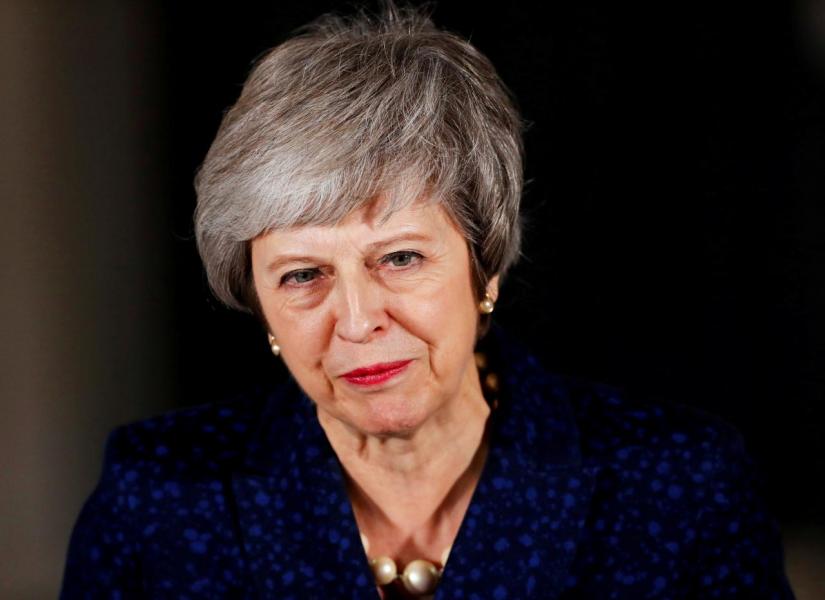 Britain`s Prime Minister Theresa May speaks outside 10 Downing Street after a confidence vote by Conservative Party members of parliament, in London, Britain December 12, 2018. REUTERS/File Photo
