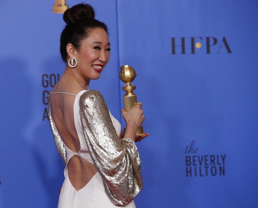 76th Golden Globe Awards - Photo Room - Beverly Hills, California, U.S., January 6, 2019 - Sandra Oh poses backstage with her award for Best Performance by an Actress in a Television Series Drama for 'Killing Eve.' REUTERS