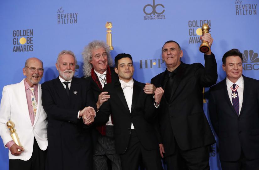 76th Golden Globe Awards - Photo Room - Beverly Hills, California, U.S., January 6, 2019 (L-R) Jim Beach, Roger Taylor, Brian May, Rami Malek with his Best Performance by an Actor in a Motion Picture - Drama, Graham King and Mike Meyers pose backstage with their Best Motion Picture - Drama for 'Bohemian Rhapsody' REUTERS