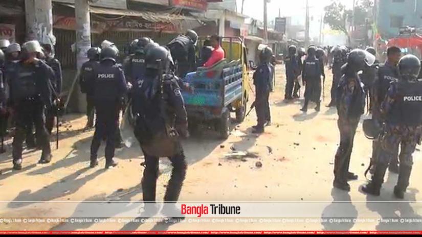 Police and RMG workers clash following a demonstration of the latter in Savar on Tuesday, Jan 8, 2019.