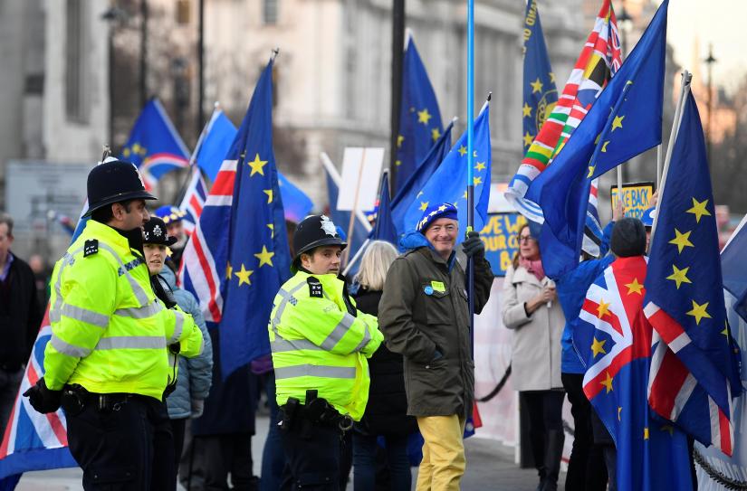 Anti-Brexit protesters demonstrate outside the Houses of Parliament in London, Britain, January 8, 2019. REUTERS