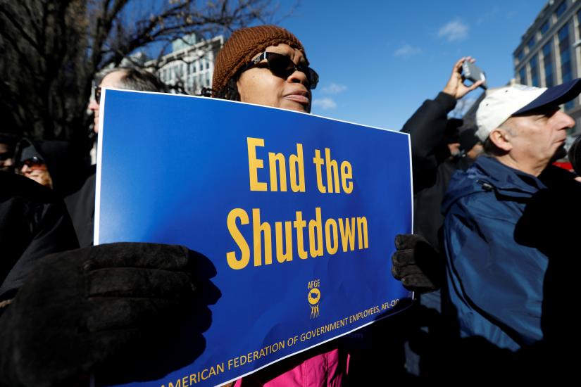 US federal government employees, contract workers and other demonstrators march during a “Rally to End the Shutdown” in Washington, US, January 10, 2019. REUTERS