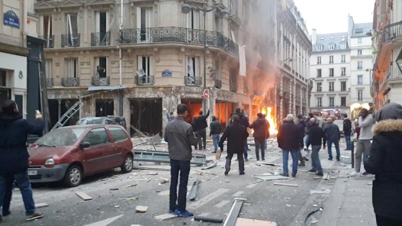 Fire burns at the site of an explosion at a bakery shop in Paris, France January 12, 2019, in this still image obtained from a social media video. David Bangura/via REUTERS