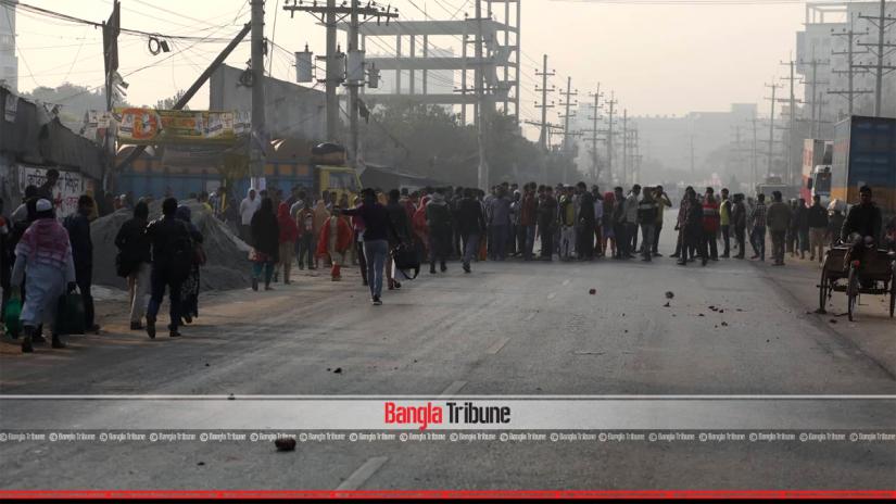 Police dispersed garment workers, who came out from the factories and blockaded the Baipail-Abdullahpur road on Monday (Jan 14) 