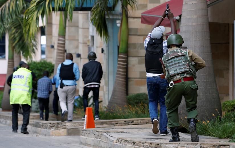 Members of security forces are seen at the scene where explosions and gunshots were heard at the Dusit hotel compound, in Nairobi, Kenya January 15, 2019. REUTERS