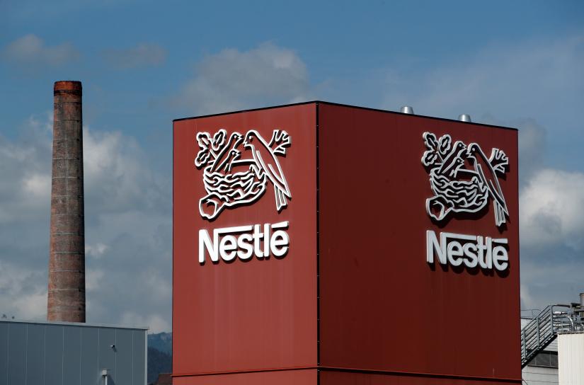 A Nestle logo is pictured on a coffee factory in Orbe, Switzerland May 31, 2018.   REUTERS/File Photo