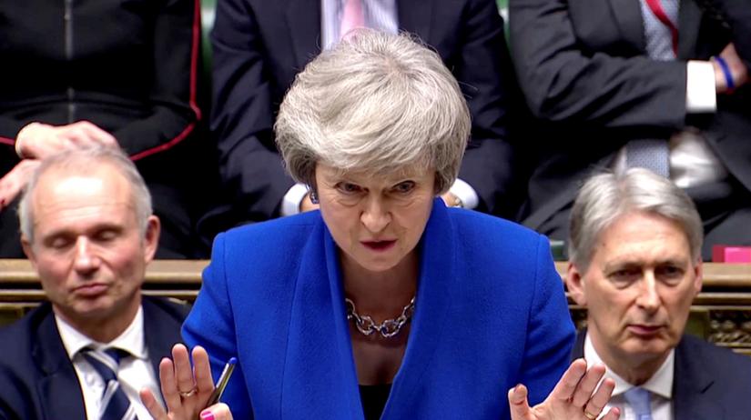 British Prime Minister Theresa May gestures as she speaks during a no confidence debate after Parliament rejected her Brexit deal, in London, Britain, January 16, 2019, in this screen grab taken from video. REUTERS