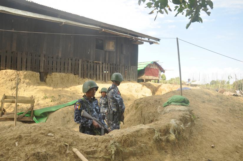 Myanmar border guard police stand guard at Goke Pi outpost in Buthidaung during a government organized media tour in Rakhine, Myanmar, January 7, 2019. REUTERS/File Photo