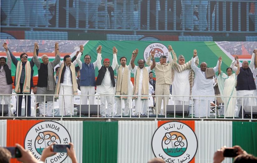 Leaders of India`s main opposition parties join their hands together during `United India` rally ahead of the general election, in Kolkata, India, January 19, 2019. REUTERS