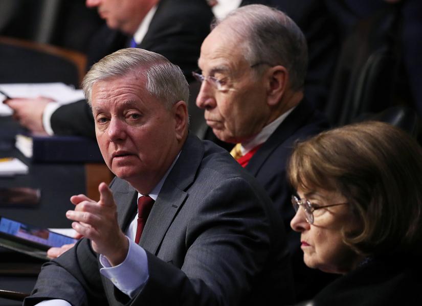 New U.S. Senate Judiciary Committee Chairman Lindsey Graham (R-SC) chairs a committee hearing on William Barr`s nomination to be attorney general of the United States as former chair Chuck Grassley (R-IA) and ranking member Sen. Dianne Feinstein (D-CA) look on on Capitol Hill in Washington, U.S., January 15, 2019. REUTERS