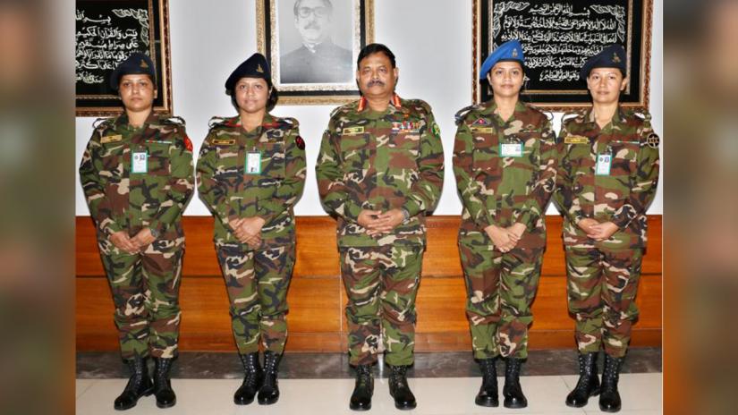 Army chief General Aziz Ahmed with the newly promoted Lt Cols Major Sanjida Hossain, Major Syeda Nazia Raihan, Major Farhana Afreen and Major Sarah Amir. PHOTO: ISPR