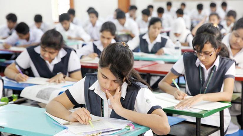 Students during an SSC exam at a school in Dhaka. File Photo/Mehedi Hasan