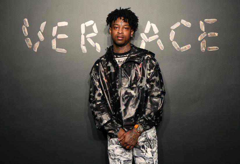 Rapper 21 Savage poses for a photo before attending the Versace presentation in New York, U.S. December 2, 2018. REUTERS