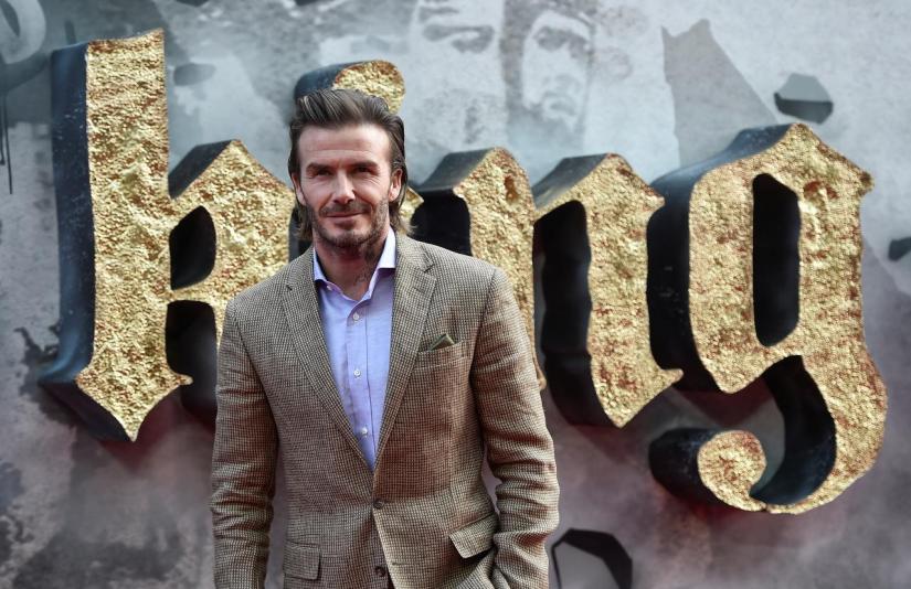 David Beckham poses at the European premiere of `King Arthur: Legend of the Sword` in London, Britain May 10, 2017. REUTERS/File Photo