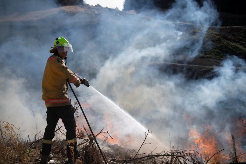 New Zealand Defence Force firefighters combat the Richmond fire near Nelson, South Island, New Zealand, February 8, 2019. Chad Sharman/New Zealand Defence Force/Handout via REUTERS