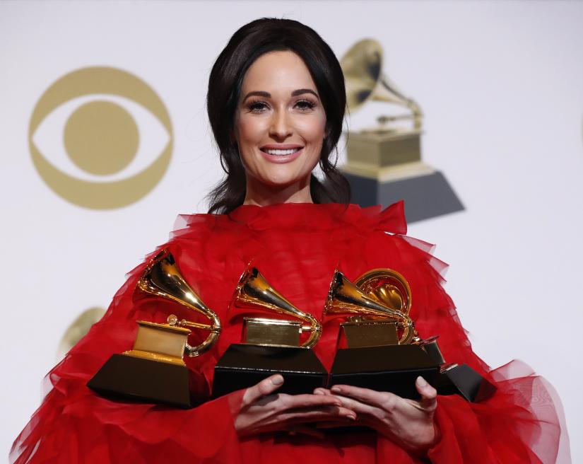 61st Grammy Awards - Photo Room - Los Angeles, California, U.S., February 10, 2019 - Kacey Musgraves poses backstage with her four awards, including for Album of the Year for 'Golden Hour.' REUTERS