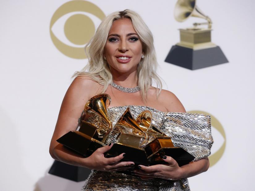 61st Grammy Awards - Photo Room - Los Angeles, California, U.S., February 10, 2019 - Lady Gaga poses backstage with her awards for Best Song Written for Visual Media and Best Pop Duo/Group Performance for 'Shallow' and her Best Pop Solo Performance for 'Joanne (Where do You Think You're Goin?).' REUTERS