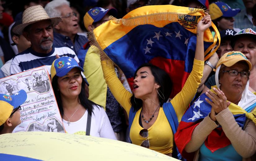 Opposition supporters take part in a rally to commemorate the Day of the Youth and to protest against Venezuelan President Nicolas Maduro`s government in Caracas, Venezuela February 12, 2019. REUTERS