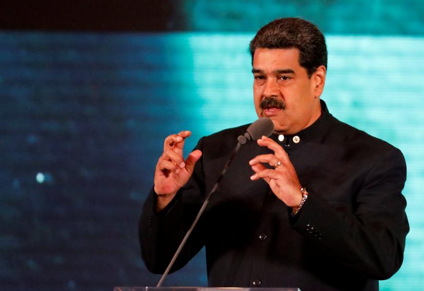 Venezuela`s President Nicolas Maduro speaks at a meeting for re-branding the country abroad, in Caracas, Venezuela February 11, 2019. REUTERS