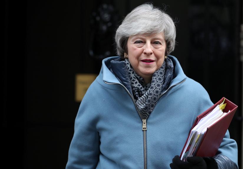 Britain`s Prime Minister Theresa May is seen outside Downing Street in London, Britain, February 13, 2019. REUTERS