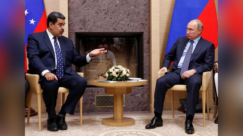 Russian President Vladimir Putin (R) meets with his Venezuelan counterpart Nicolas Maduro at the Novo-Ogaryovo state residence outside Moscow, Russia December 5, 2018. REUTERS/File Photo