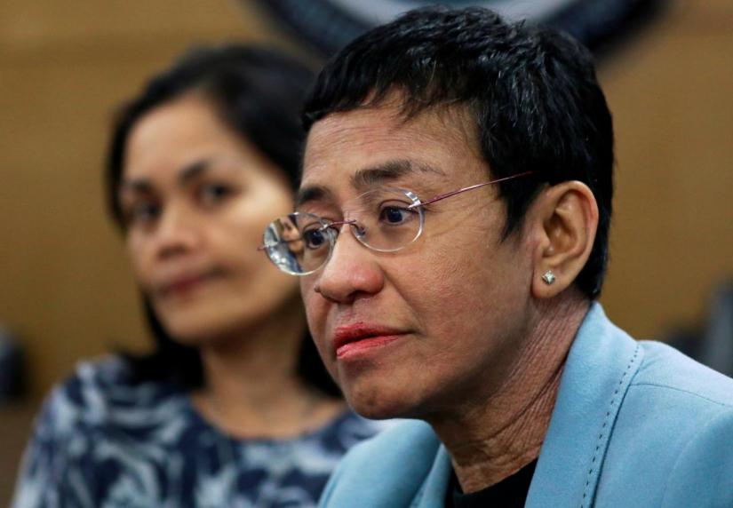 Rappler`s CEO Maria Ressa waits inside the National Bureau of Investigation in Manila, Philippines, February 13, 2019. REUTERS
