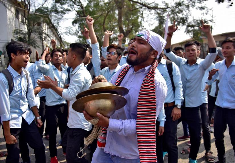 Students shout slogans during a protest to demand the withdrawal of the Citizenship Amendment Bill, a bill passed by India`s lower house of parliament that aims to give citizenship to non-Muslims from neighbouring countries, in Nagaon district in the northeastern state of Assam, India, February 13, 2019. REUTERS