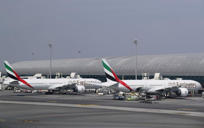 Emirates Airlines Boeing 777-300ER airliners are seen parked at Terminal 3 of Dubai International Airport, December 26, 2018. REUTERS/file photo