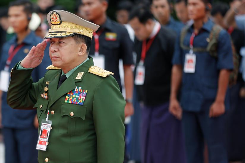Myanmar`s Commander in Chief Senior General Min Aung Hlaing salutes as he attends an event marking Martyrs` Day at Martyrs` Mausoleum in Yangon, Myanmar July 19, 2018. REUTERS/File Photo
