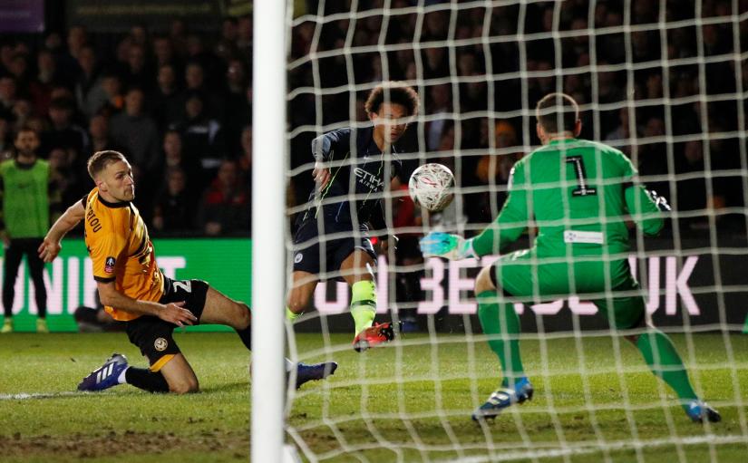 FA Cup Fifth Round - Newport County AFC v Manchester City - Rodney Parade, Newport, Britain - February 16, 2019 Manchester City's Leroy Sane scores their first goal past Newport's Joe Day Action Images via Reuters