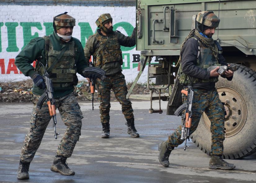 Indian Army soldiers arrive near the site of a gun battle between suspected militants and Indian security forces in Pinglan village in south Kashmir`s Pulwama district February 18, 2019. REUTERS