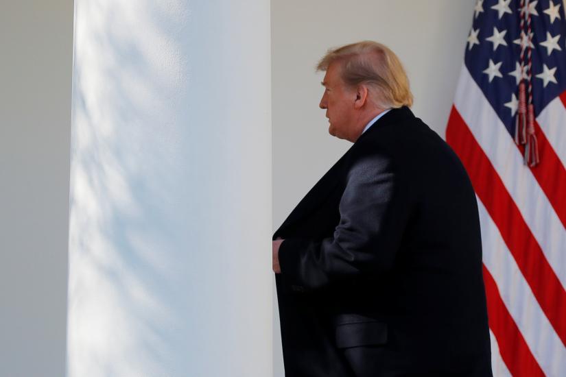 US President Donald Trump heads back to the Oval Office after declaring a national emergency at the US-Mexico border during remarks