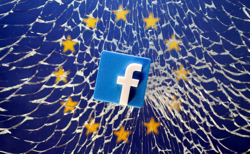 A 3D printed Facebook logo is placed on broken glass above a printed EU flag in this illustration taken January 28, 2019. REUTERS
