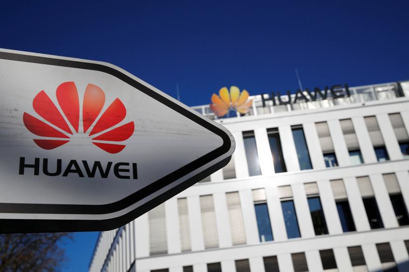 The logo of Huawei Technologies is pictured in front of the German headquarters of the Chinese telecommunications giant in Duesseldorf, Germany, February 18, 2019. REUTERS