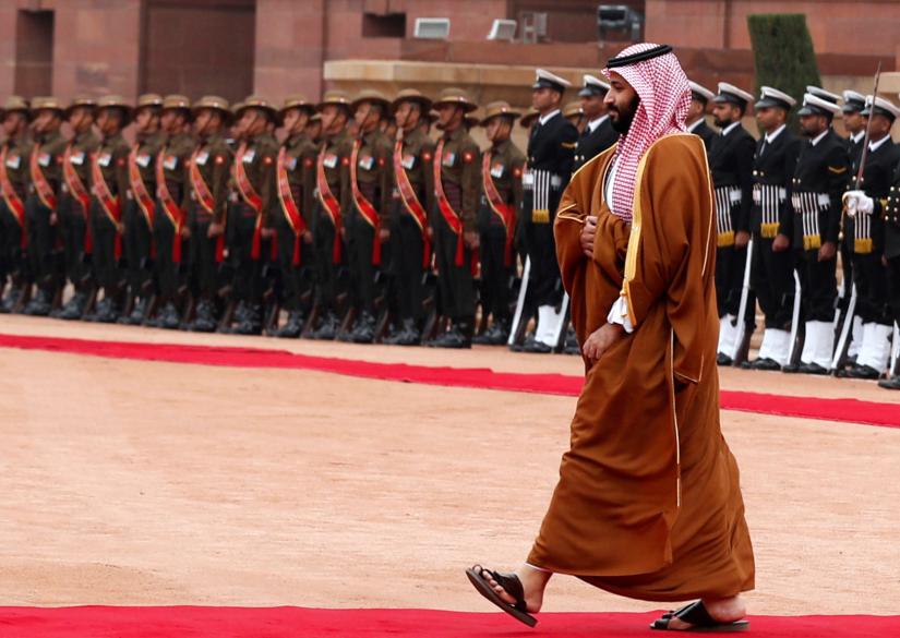 Saudi Arabia`s Crown Prince Mohammed bin Salman walks back after inspecting an honour guard during his ceremonial reception at the forecourt of Rashtrapati Bhavan presidential palace in New Delhi, India, February 20, 2019. REUTERS