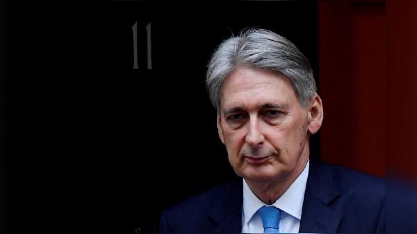 Britain`s Chancellor of the Exchequer Philip Hammond is seen outside Downing Street in London, Britain January 30, 2019. REUTERS/File Photo
