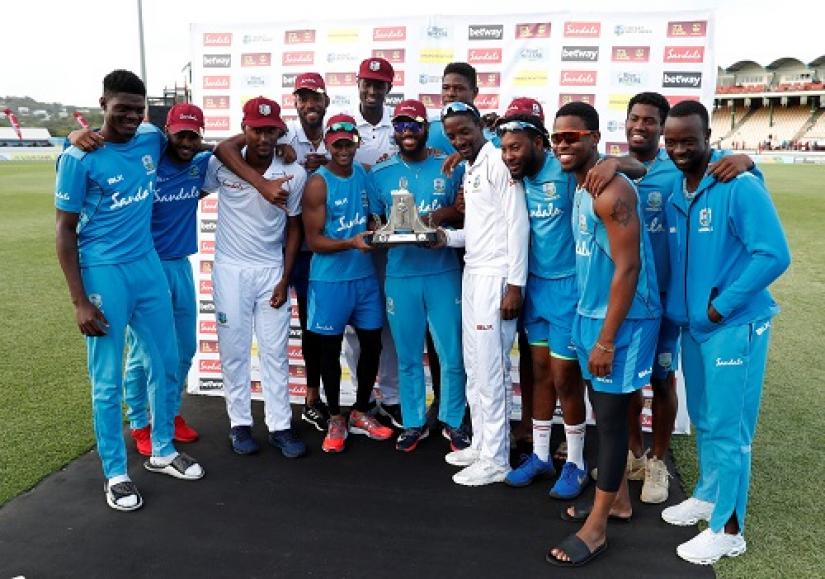 West Indies` players celebrate with the Wisden Trophy after the match against England at Darren Sammy National Cricket Stadium, St Lucia on Feb 12, 2019. Reuters