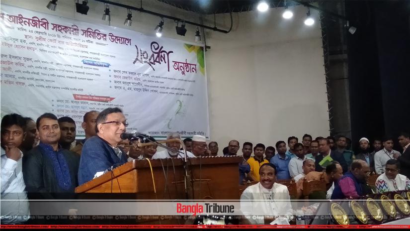 Law Minister Anisul Huq addresses an event in Dhaka on Saturday (Feb 23).