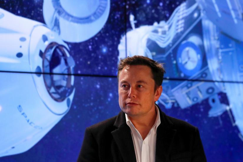 SpaceX founder Elon Musk looks on at a post-launch news conference after the SpaceX Falcon 9 rocket, carrying the Crew Dragon spacecraft, lifted off on an uncrewed test flight to the International Space Station from the Kennedy Space Center in Cape Canaveral, Florida, U.S., March 2, 2019. REUTERS